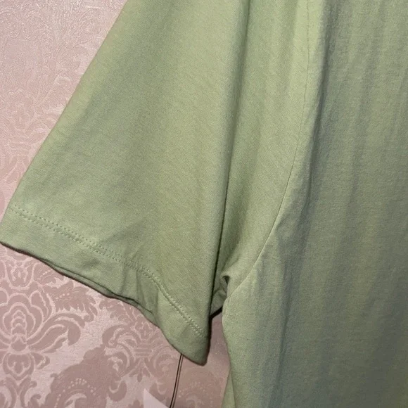 Nike Light Green Graphic Logo Short Sleeve Tee with Neon Orange Accents - Picture 9 of 10